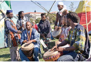 Drummers taught by Baba Ngoma pay tribute to their teacher